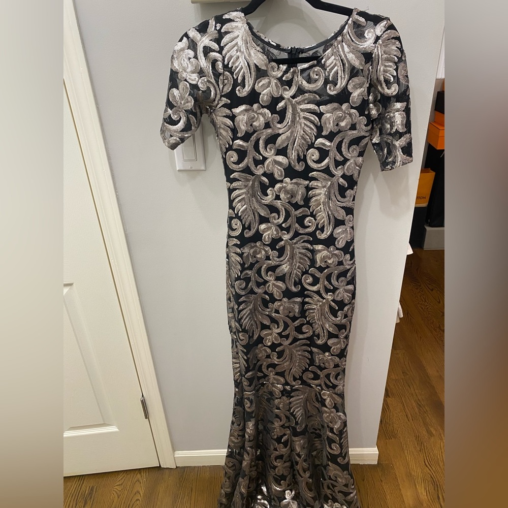 Worn once long silver and black mermaid gown